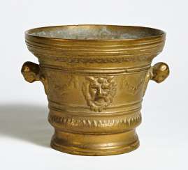 Large mortar with a lion mask Large mortar with a lion mask