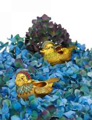 Two ornamental ducks with enamel decoration and colored stones Two ornamental ducks with enamel decoration and colored stones