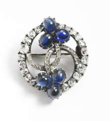 Edward Schramm, Faberge Russian Faberge Royal diamond and sapphire brooch, mounted in silver and gold. St Petersburg, 1890s. Diam. 2.5 cm Edward Schramm, Faberge Russian Faberge Royal diamond and sapphire brooch, mounted in silver and gold. St Petersburg, 1890s. Diam. 2.5 cm