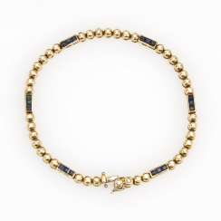 Tennis bracelet with diamonds and sapphires Tennis bracelet with diamonds and sapphires