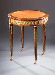 Round side table on castors Round side table on castors