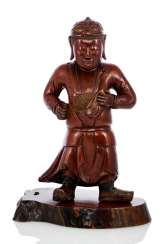 Figure of a boy in a suit of armor, dressed in wood with varnish edition Figure of a boy in a suit of armor, dressed in wood with varnish edition