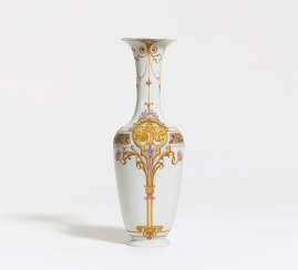 Small narrow-necked porcelain vase with relief decor Small narrow-necked porcelain vase with relief decor