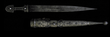 Dagger Kama in the sheath. Dagger Kama in the sheath.