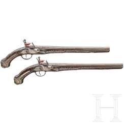 A pair of silver-mounted flintlock oriental pistols, Ottoman, around 1820/30 A pair of silver-mounted flintlock oriental pistols, Ottoman, around 1820/30