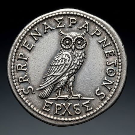 Древнегреческая серебряная монета с совой