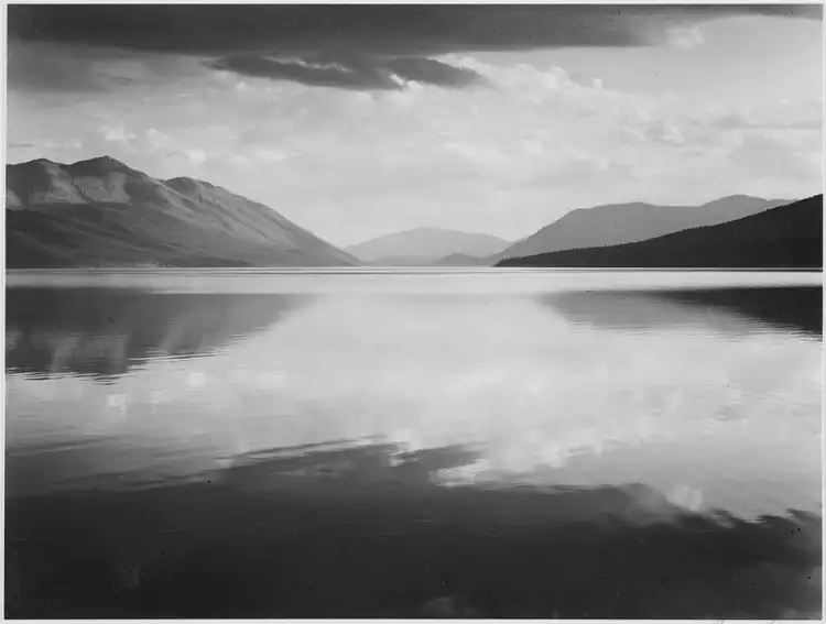 Artist. Ansel Easton Adams. Evening, Lake Macdonald in Glacier National Park Artist. Ansel Easton Adams. Evening, Lake Macdonald in Glacier National Park